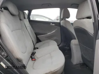 2014 Hyundai Accent SE z VIN KMHCU5AE4EU183469, wystawiony jako Copart lot #52501505 z przebiegiem 112 034 mil mil oraz Szkoda całkowita • Salvage title. Historia ofert i sprzedaży dostępna na DreamBid. Obrazek 10.