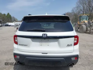 2021 Honda Passport Elite z VIN 5FNYF8H08MB014739, wystawiony jako IAAI lot #42137913 z przebiegiem 50 580 mil mil oraz . Historia ofert i sprzedaży dostępna na DreamBid. Obrazek 16.