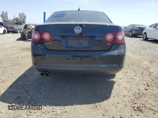 2010 Volkswagen Jetta Limited Edition with VIN 3VWAX7AJ0AM130601, listed as a Copart auction lot 54050965 with 132,421 mi miles and Salvage title. Bid and sale history available at DreamBid. Image 6.