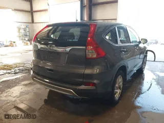 2015 Honda CR-V EX with VIN 3CZRM3H57FG706605, listed as a IAAI auction lot 41233942 with 112,842 mi miles. Bid and sale history available at carsss.com. Image 4.