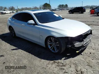 2019 BMW 4 Series 430i with VIN WBA4J1C50KBM14346, listed as a IAAI auction lot 41770469 with 87,026 mi miles. Bid and sale history available at carsss.com. Image 1.