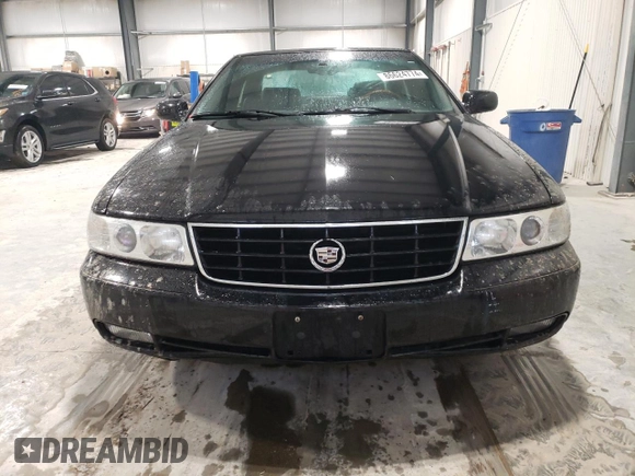 2002 Cadillac Seville Touring STS z VIN 1G6KY54962U158476, wystawiony jako Copart lot #86624774 z przebiegiem 77 818 mil mil oraz Szkoda całkowita • Salvage title. Historia ofert i sprzedaży dostępna na DreamBid. Obrazek 5.