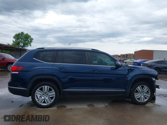 2019 Volkswagen Atlas SEL with VIN 1V2ER2CA9KC604299, listed as a IAAI auction lot 42472488 with 62,257 mi miles and . Bid and sale history available at DreamBid. Image 14.