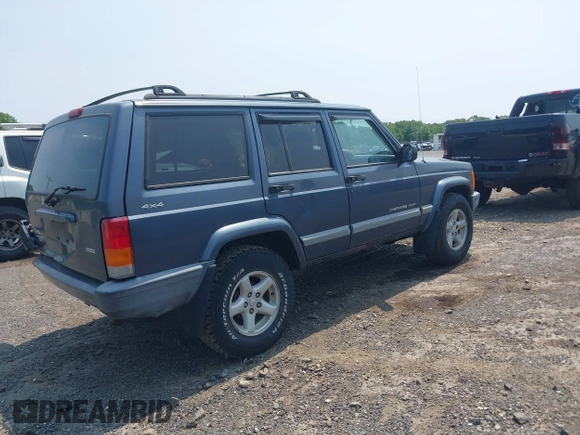 2001 Jeep Cherokee Sport z VIN 1J4FF48S51L531033, wystawiony jako IAAI lot #42423910 z przebiegiem 90 438 mil mil oraz . Historia ofert i sprzedaży dostępna na DreamBid. Obrazek 4.