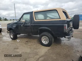 1988 Ford Bronco XL with VIN 1FMEU15N3JLA20890, listed as a Copart auction lot 79555004 with 0 mi miles and Salvage Title. Bid and sale history available at carsss.com. Image 2.