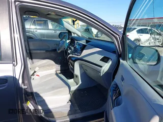 2014 Toyota Sienna L with VIN 5TDZK3DC3ES506658, listed as a IAAI auction lot 41469391 with 169,848 mi miles. Bid and sale history available at carsss.com. Image 5.