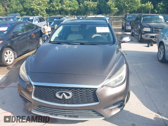 2017 Infiniti QX30 Premium z VIN SJKCH5CP4HA023330, wystawiony jako IAAI lot #42407253 z przebiegiem 132 317 mil mil oraz . Historia ofert i sprzedaży dostępna na DreamBid. Obrazek 6.