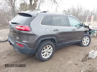 2015 Jeep Cherokee Latitude with VIN 1C4PJMCS9FW769294, listed as a IAAI auction lot 41810346 with 94,975 mi miles and . Bid and sale history available at DreamBid. Image 4.