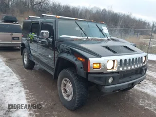 2003 Hummer H2 with VIN 5GRGN23UX3H106356, listed as a IAAI auction lot 41185603 with 1 mi miles. Bid and sale history available at carsss.com. Image 1.