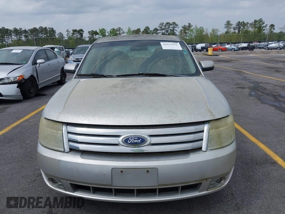 2008 Ford Taurus SEL with VIN 1FAHP24W88G178210, listed as a IAAI auction lot 41933552 with 142,971 mi miles. Bid and sale history available at carsss.com. Image 6.