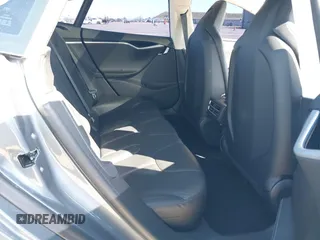 2014 Tesla Model S 60 with VIN 5YJSA1S10EFP32851, listed as a IAAI auction lot 41730746 with 91,657 mi miles and . Bid and sale history available at DreamBid. Image 8.