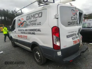 2016 Ford Transit Cargo with VIN 1FTYR1ZM7GKA14464, listed as a IAAI auction lot 41230405 with 120,604 mi miles and . Bid and sale history available at DreamBid. Image 3.