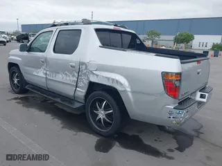 2006 Honda Ridgeline RTL with VIN 2HJYK16556H514349, listed as a IAAI auction lot 42076938 with 215,048 mi miles. Bid and sale history available at carsss.com. Image 3.