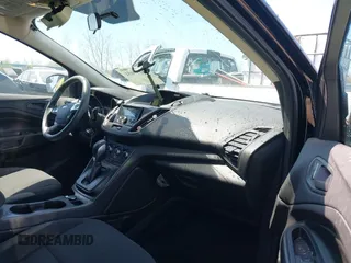 2016 Ford Escape S with VIN 1FMCU0F73GUB94060, listed as a IAAI auction lot 42105995 with 76,758 mi miles. Bid and sale history available at carsss.com. Image 5.