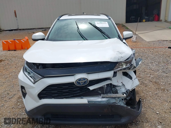 2020 Toyota RAV4 Hybrid XLE with VIN 2T3RWRFV5LW094731, listed as a IAAI auction lot 42349123 with 60,927 mi miles and . Bid and sale history available at DreamBid. Image 12.