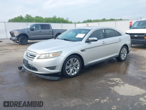 2011 Ford Taurus Limited z VIN 1FAHP2FW9BG118585, wystawiony jako IAAI lot #42124229 z przebiegiem 182 096 mil mil oraz . Historia ofert i sprzedaży dostępna na DreamBid. Obrazek 2.