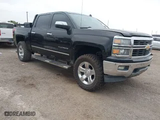 2014 Chevrolet Silverado 1500 LTZ with VIN 3GCUKSECXEG229900, listed as a IAAI auction lot 41962785 with 156,984 mi miles. Bid and sale history available at carsss.com. Image 1.