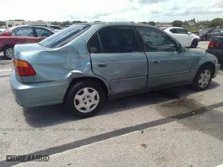 1999 Honda Civic EX with VIN 1HGEJ8643XL021026, listed as a IAAI auction lot 41686947 with 181,103 mi miles. Bid and sale history available at carsss.com. Image 4.