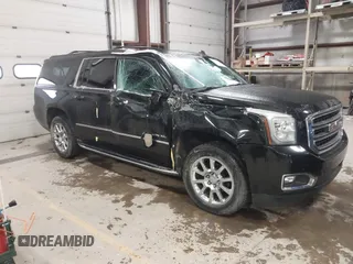 2015 GMC Yukon XL SLT with VIN 1GKS2HKC9FR175011, listed as a IAAI auction lot 41510519 with 194,136 mi miles. Bid and sale history available at carsss.com. Image 1.
