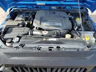 2015 Jeep Wrangler Unlimited Sport with VIN 1C4BJWDG1FL683558, listed as a Copart auction lot 59883545 with 107,267 mi miles and Salvage title. Bid and sale history available at DreamBid. Image 12.