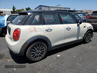 2017 MINI Hardtop 4 Door Cooper with VIN WMWXU1C32H2F77790, listed as a Copart auction lot 62352415 with 71,661 mi miles and Salvage title. Bid and sale history available at DreamBid. Image 3.