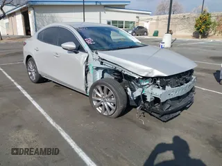 2023 Mazda 3 S Select with VIN 3MZBPABM2PM377721, listed as a IAAI auction lot 41456320 with 6,711 mi miles and . Bid and sale history available at DreamBid. Image 1.