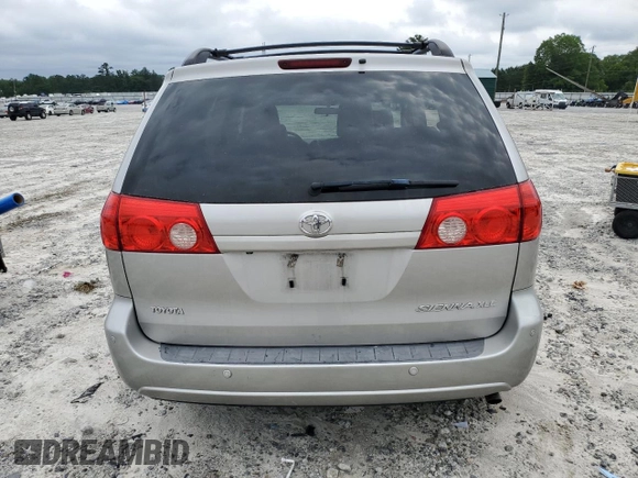 2010 Toyota Sienna XLE with VIN 5TDYK4CC1AS322395, listed as a Copart auction lot 60520215 with 148,725 mi miles and Salvage title. Bid and sale history available at DreamBid. Image 6.