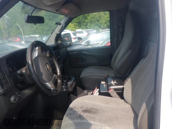 2015 Chevrolet Express Cargo with VIN 1GCWGFCF1F1159413, listed as a IAAI auction lot 42631369 with 155,801 mi miles and . Bid and sale history available at DreamBid. Image 14.