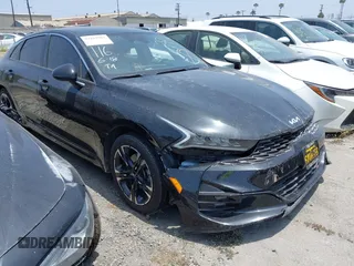 2022 Kia K5 GT-Line z VIN 5XXG64J2XNG095158, wystawiony jako IAAI lot #42163963 z przebiegiem 59 756 mil mil oraz . Historia ofert i sprzedaży dostępna na DreamBid. Obrazek 1.