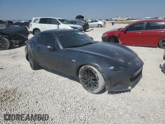 2023 Mazda MX-5 Miata Grand Touring z VIN JM1NDAM70P0550719, wystawiony jako Copart lot #75485484 z przebiegiem 21 110 mil mil oraz Szkoda całkowita • Salvage title. Historia ofert i sprzedaży dostępna na DreamBid. Obrazek 4.