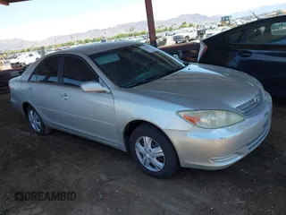 2004 Toyota Camry LE with VIN 4T1BE32KX4U895064, listed as a IAAI auction lot 42632673 with 203,870 mi miles and . Bid and sale history available at DreamBid. Image 1.