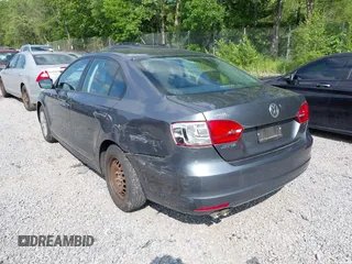 2014 Volkswagen Jetta S with VIN 3VW2K7AJ2EM352047, listed as a IAAI auction lot 42556420 with 104,798 mi miles and . Bid and sale history available at DreamBid. Image 6.