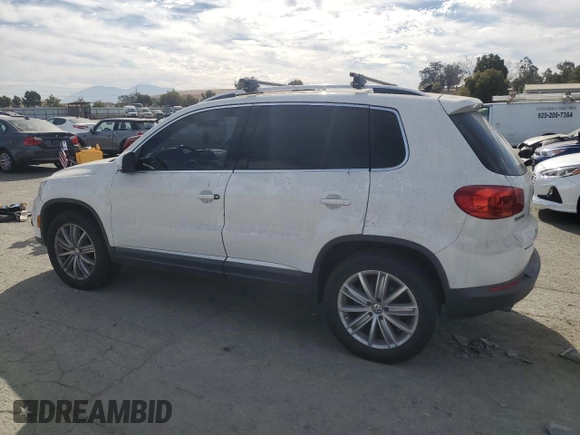 2012 Volkswagen Tiguan S with VIN WVGBV7AX3CW575463, listed as a Copart auction lot 77889064 with 168,520 mi miles and Salvage Title. Bid and sale history available at DreamBid. Image 2.