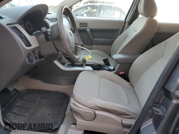 2009 Ford Focus S with VIN 1FAHP34N79W212190, listed as a Copart auction lot 44628945 with 129,568 mi miles and Salvage Title. Bid and sale history available at carsss.com. Image 7.