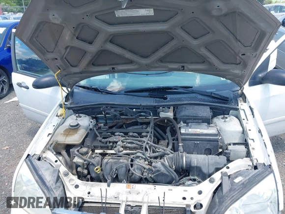 2007 Ford Focus S with VIN 1FAFP34N47W183106, listed as a IAAI auction lot 42540411 with 281,111 mi miles and . Bid and sale history available at DreamBid. Image 10.
