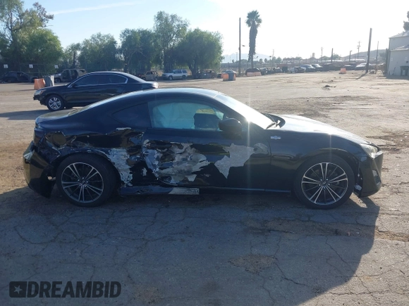 2015 Scion FR-S z VIN JF1ZNAA14F9703780, wystawiony jako IAAI lot #41493648 z przebiegiem 125 997 mil mil oraz . Historia ofert i sprzedaży dostępna na DreamBid. Obrazek 14.