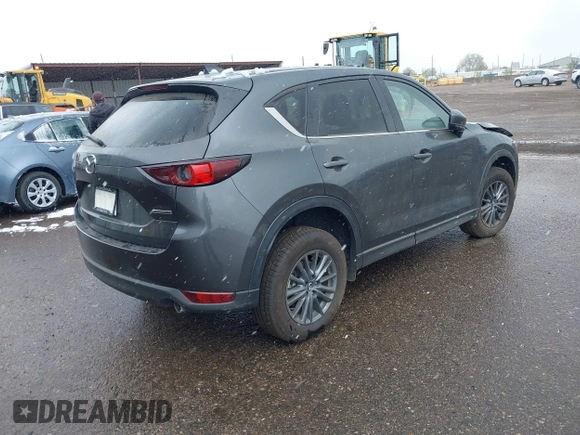 2021 Mazda CX-5 Touring with VIN JM3KFBCM8M0311433, listed as a IAAI auction lot 40554094 with 23,319 mi miles. Bid and sale history available at carsss.com. Image 4.