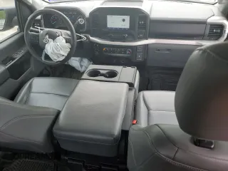 2021 Ford F-150 XL with VIN 1FTFX1E51MFC05216, listed as a Copart auction lot 56571785 with 94,584 mi miles and Salvage title. Bid and sale history available at DreamBid. Image 8.