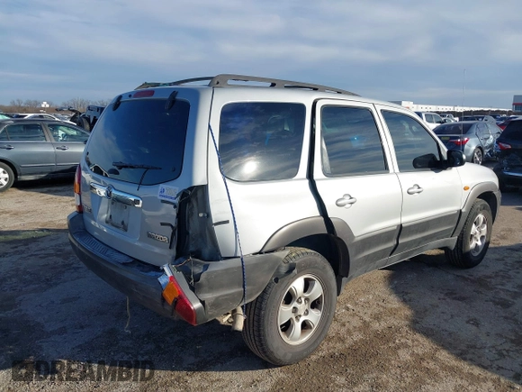 2003 Mazda Tribute LX with VIN 4F2YZ04183KM44733, listed as a IAAI auction lot 41472662 with 246,522 mi miles and . Bid and sale history available at DreamBid. Image 6.