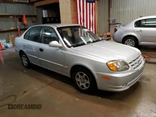 2004 Hyundai Accent GL with VIN KMHCG45C04U544804, listed as a Copart auction lot 72912984 with 121,178 mi miles and Salvage Title. Bid and sale history available at carsss.com. Image 4.