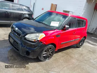2011 Kia Soul + with VIN KNDJT2A21B7230986, listed as a IAAI auction lot 41683588 with 175,790 mi miles. Bid and sale history available at carsss.com. Image 2.