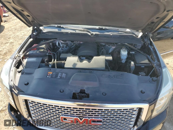 2016 GMC Yukon Denali with VIN 1GKS2CKJ9GR301628, listed as a Copart auction lot 48937035 with 121,863 mi miles and Salvage Title. Bid and sale history available at carsss.com. Image 12.