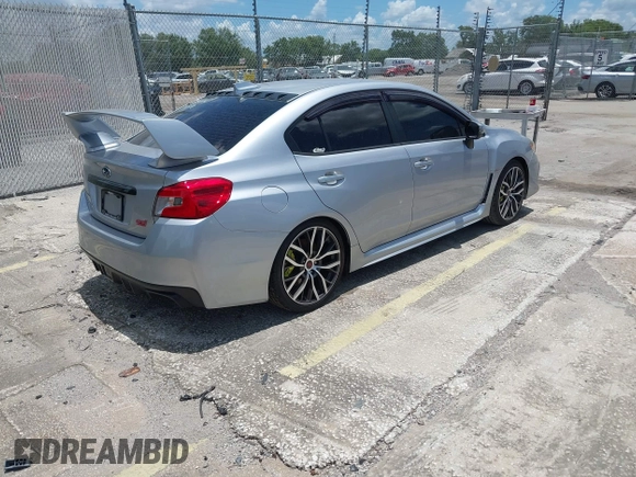 2021 Subaru WRX STI with VIN JF1VA2E66M9822014, listed as a IAAI auction lot 42499316 with 55,625 mi miles and . Bid and sale history available at DreamBid. Image 4.