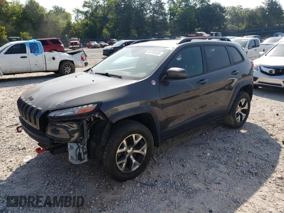 2014 Jeep Cherokee Trailhawk with VIN 1C4PJMBS1EW304718, listed as a Copart auction lot 64105485 with 151,315 mi miles and Salvage title. Bid and sale history available at DreamBid. Image 1.