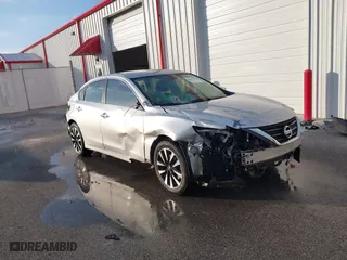 2018 Nissan Altima 2.5 SL with VIN 1N4AL3AP5JC264698, listed as a IAAI auction lot 41018548 with 84,197 mi miles. Bid and sale history available at carsss.com. Image 1.