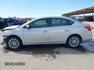 2019 Nissan Sentra SV z VIN 3N1AB7AP1KL604264, wystawiony jako IAAI lot #42304142 z przebiegiem 87 506 mil mil oraz . Historia ofert i sprzedaży dostępna na DreamBid. Obrazek 14.