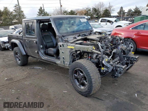 2021 Jeep Gladiator Rubicon with VIN 1C6JJTBG4ML504141, listed as a Copart auction lot 43367565 with 56,879 mi miles and Salvage title. Bid and sale history available at DreamBid. Image 4.
