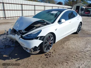 2020 Tesla Model 3 Performance with VIN 5YJ3E1EC2LF623827, listed as a IAAI auction lot 41360239 with NaN miles. Bid and sale history available at carsss.com. Image 19.
