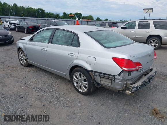 2010 Toyota Avalon XL with VIN 4T1BK3DB6AU369581, listed as a IAAI auction lot 42159063 with 137,996 mi miles and . Bid and sale history available at carsss.com. Image 3.