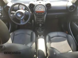 2013 MINI Countryman S ALL4 z VIN WMWZC5C51DWP30390, wystawiony jako Copart lot #59869105 z przebiegiem 111 843 mil mil oraz Szkoda całkowita • Salvage title. Historia ofert i sprzedaży dostępna na DreamBid. Obrazek 8.
